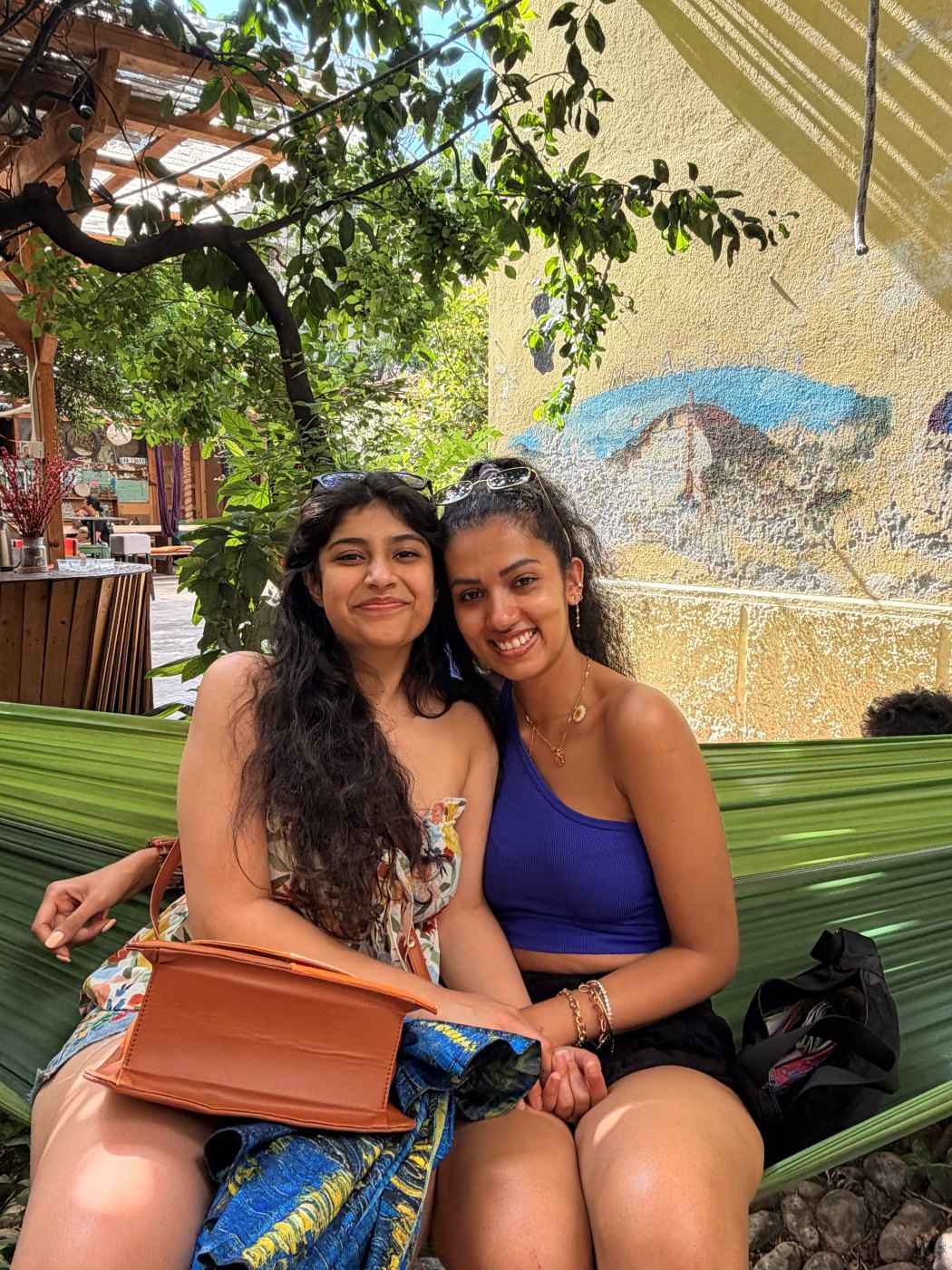 Sukanya and Pallavi, co-founders of The P&S Atelier, together in a sunlit garden